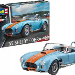 Niebieski model samochodu '65 Shelby Cobra 427 z pomarańczowymi pasami, obok pudełka z modelem Revell.