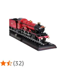 Model czerwonego pociągu Hogwarts Express na czarnym torowisku z napisem "HOGWARTS EXPRESS".