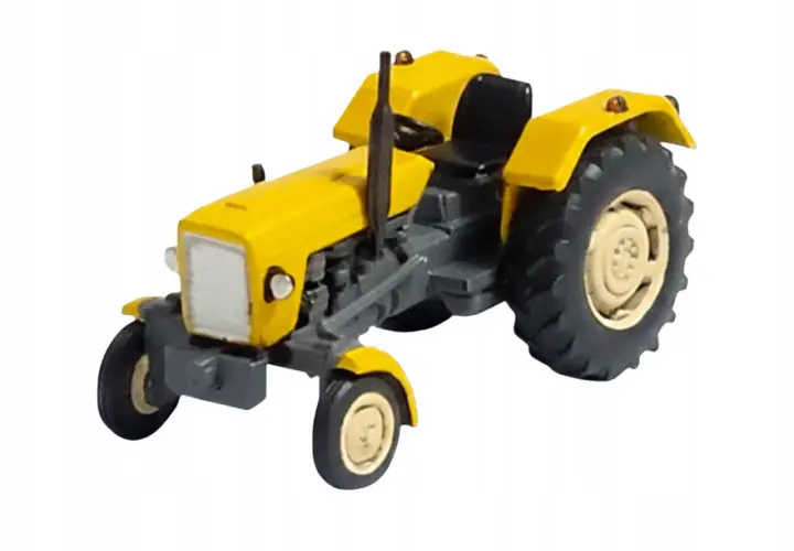 Żółty traktor do składania, model kolekcjonerski.