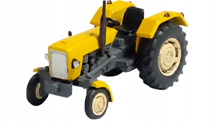 Żółty traktor do składania, model kolekcjonerski.