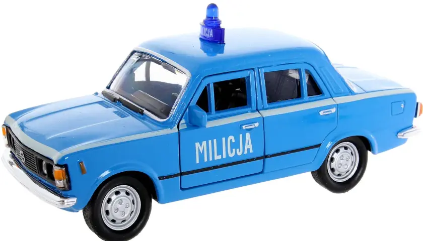 Niebieski fiat 125p milicja z niebieską syreną na dachu, gotowy do akcji.