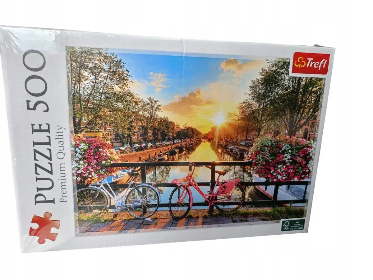Puzzle 500 elementów z widokiem na kanał w Amsterdamie o zachodzie słońca, z rowerami i kwiatami.