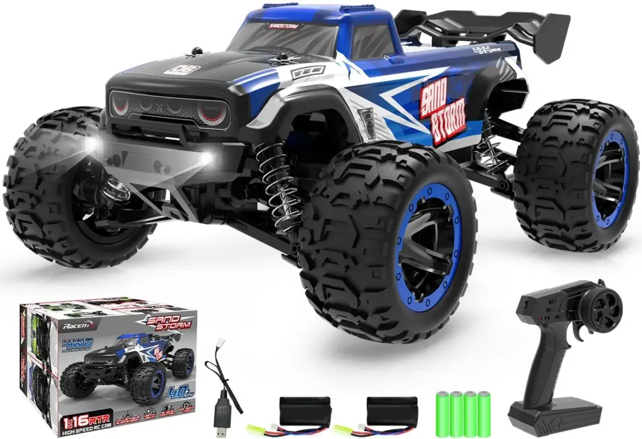 Niebiesko-czarny samoch&oacute;d monster truck z dużymi oponami i pilotem. Gotowy do akcji!
