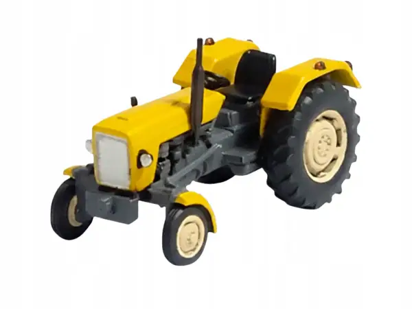 Żółty traktor do składania, model kolekcjonerski.